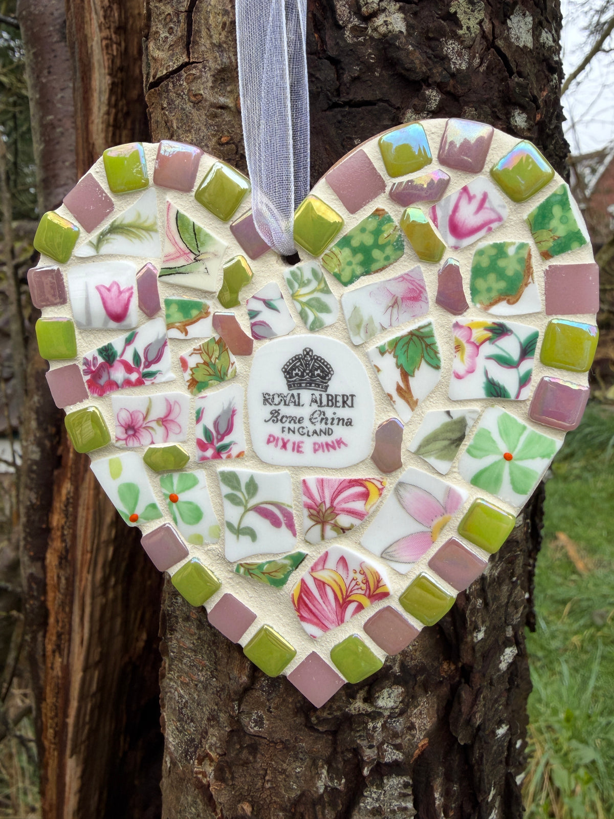 Royal Albert Pixie Pink mosaic heart showing backstamp detail at centre surrounded by floral china patchwork